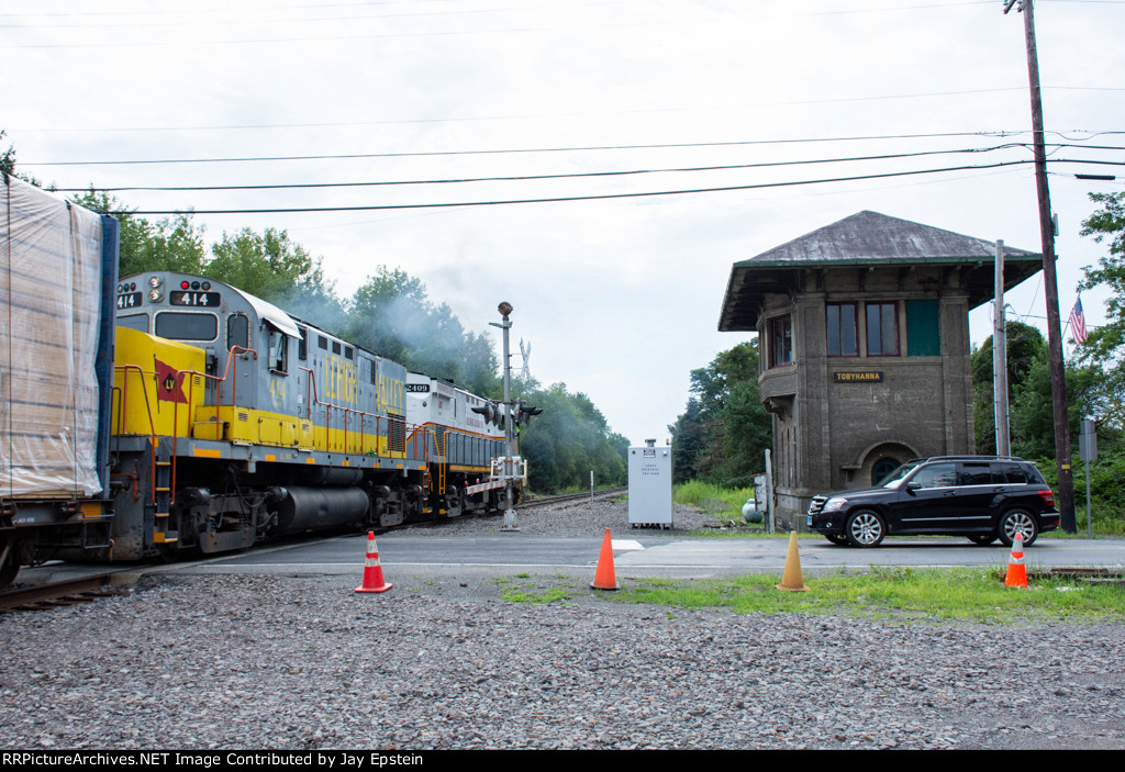 PO-74 passes the old DL&W tower at Tobyhanna